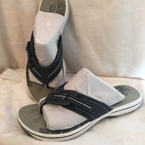 Clark’s flip flops